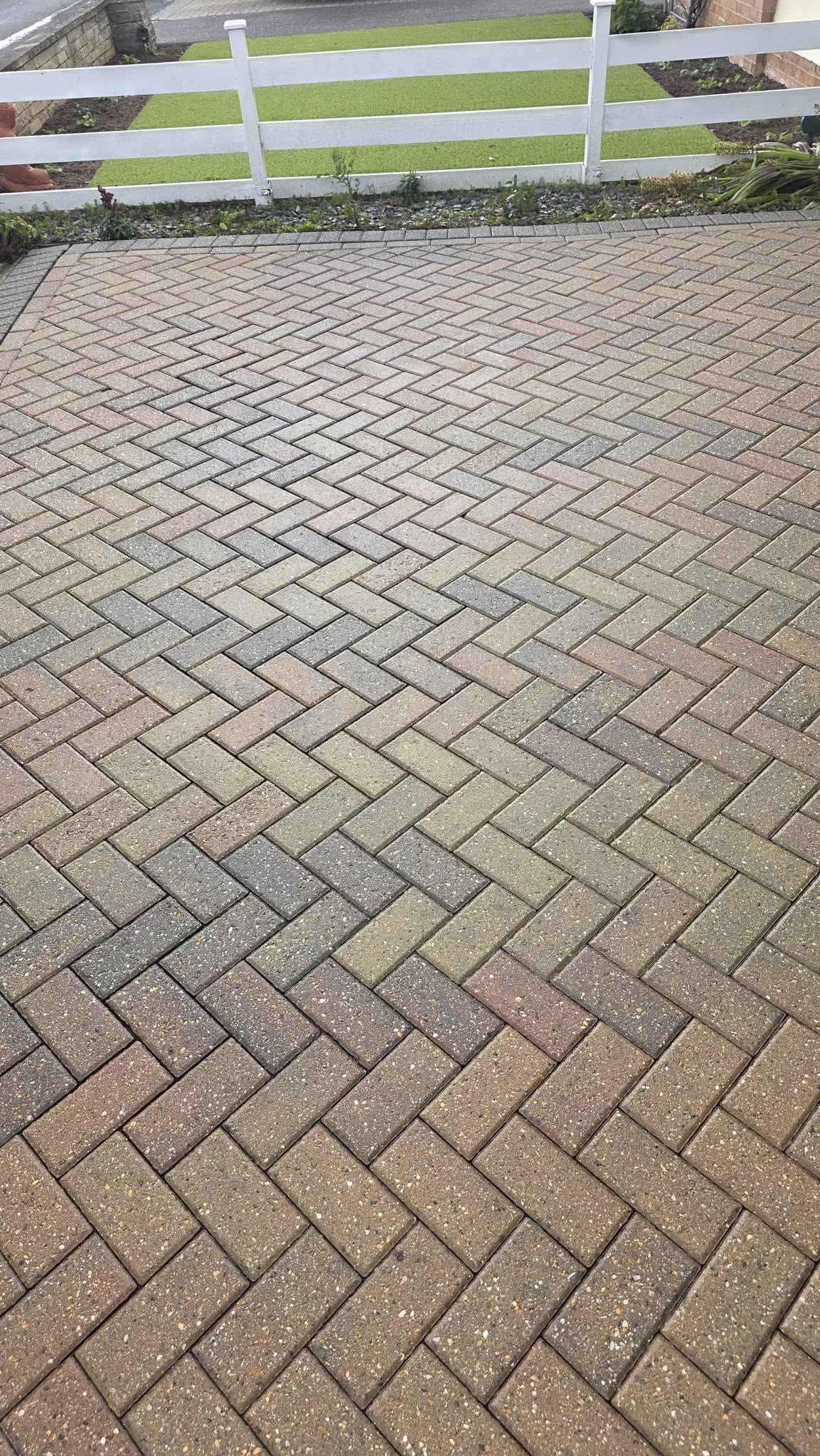 The same block paving drive after jet washing, stain gone