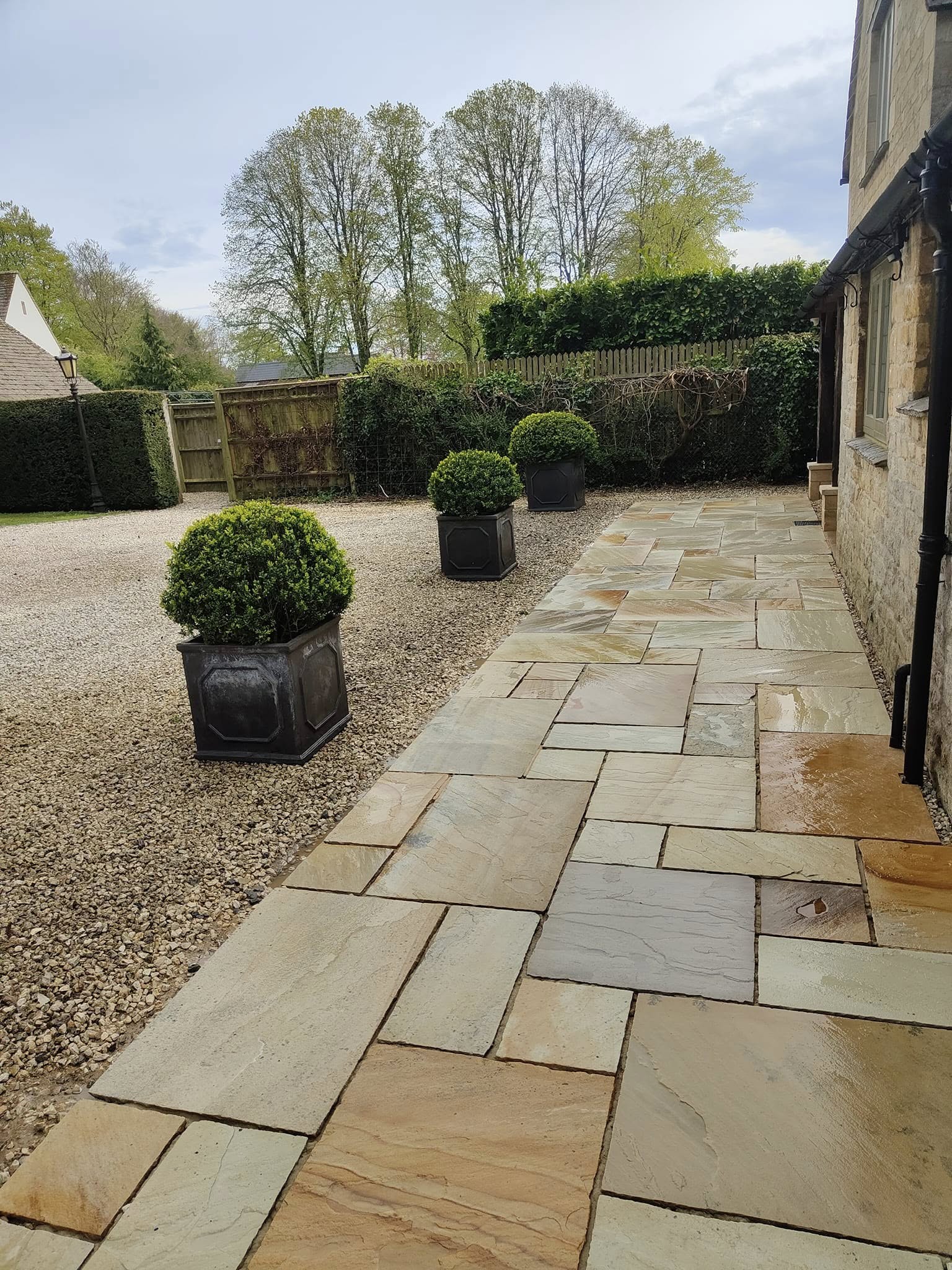 The same stone path after cleaning, the stone's colour back